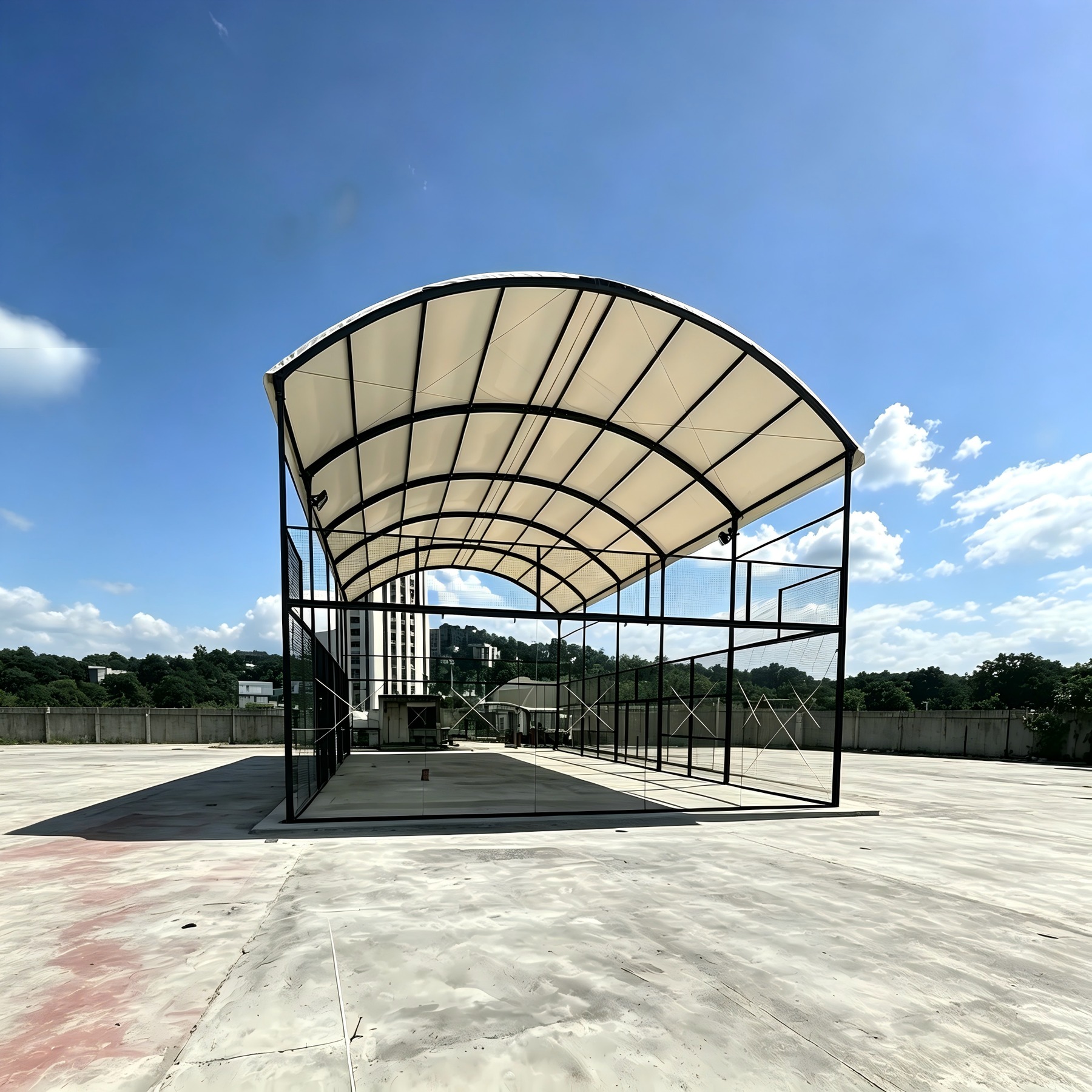 Covered padel court with curved membrane roof