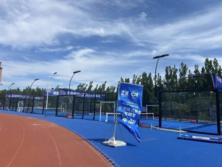 XTZ padel court with blue frame beside a running track